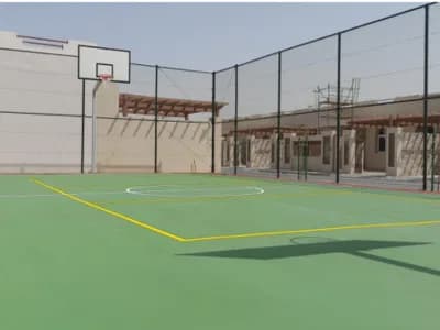 Perimeter fencing installed around an outdoor sports court